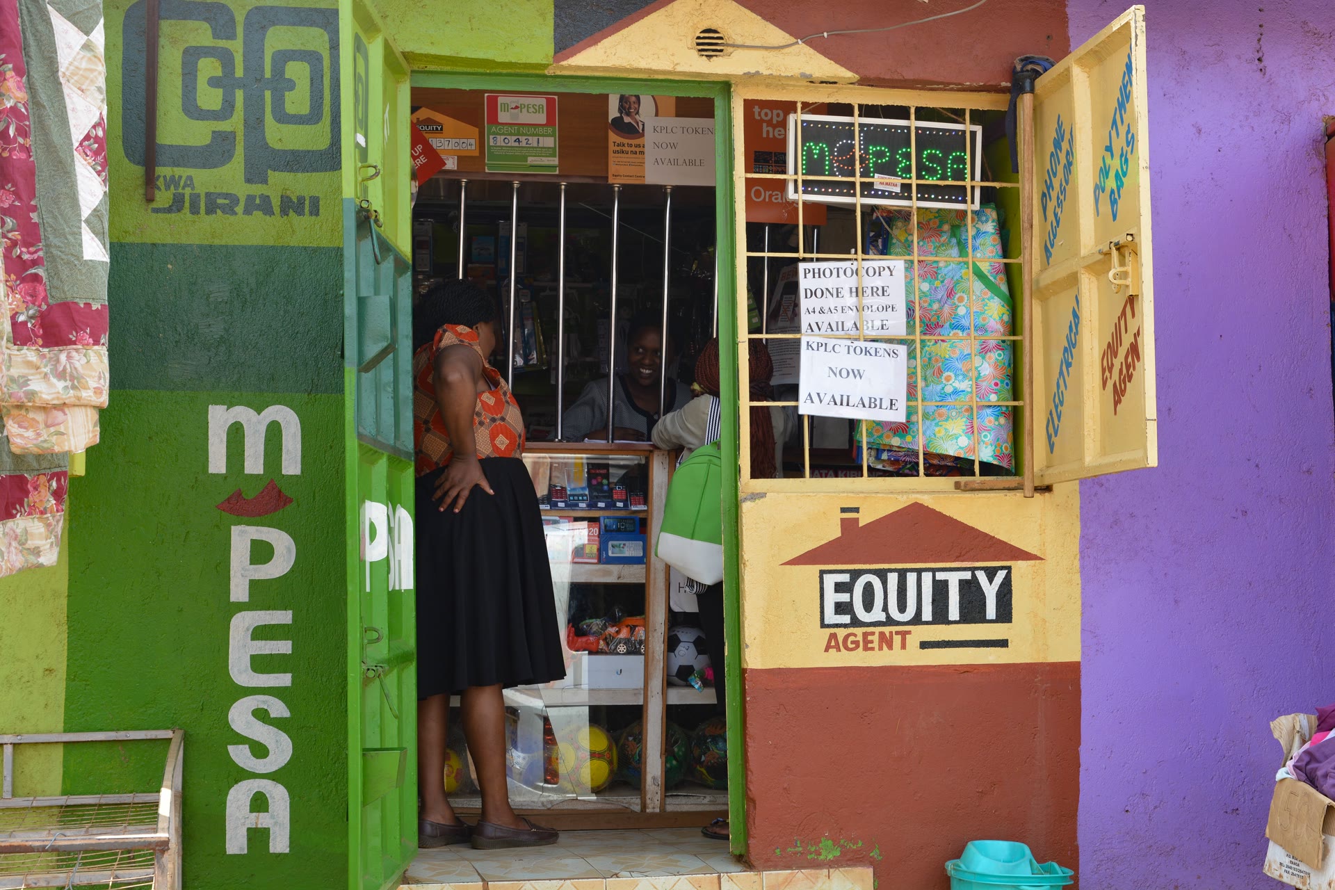 M-Pesa mobile money agent and Equity Bank kiosk in Nairobi, Kenya