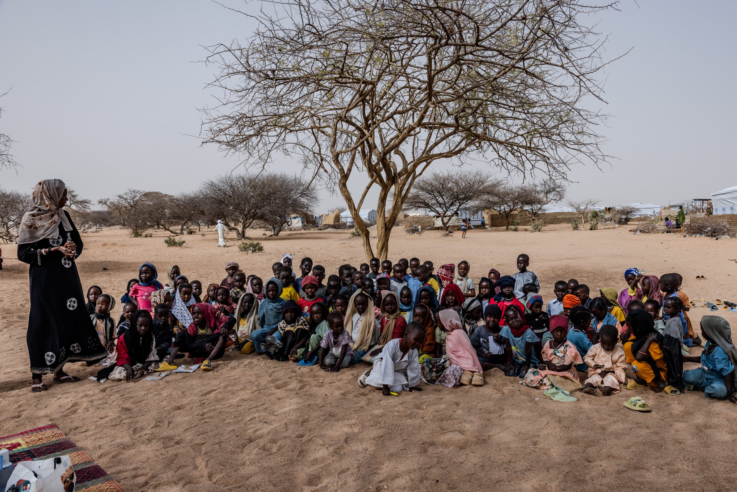 Sudanese displaced civilians in a refugee camp representing the humanitarian crisis